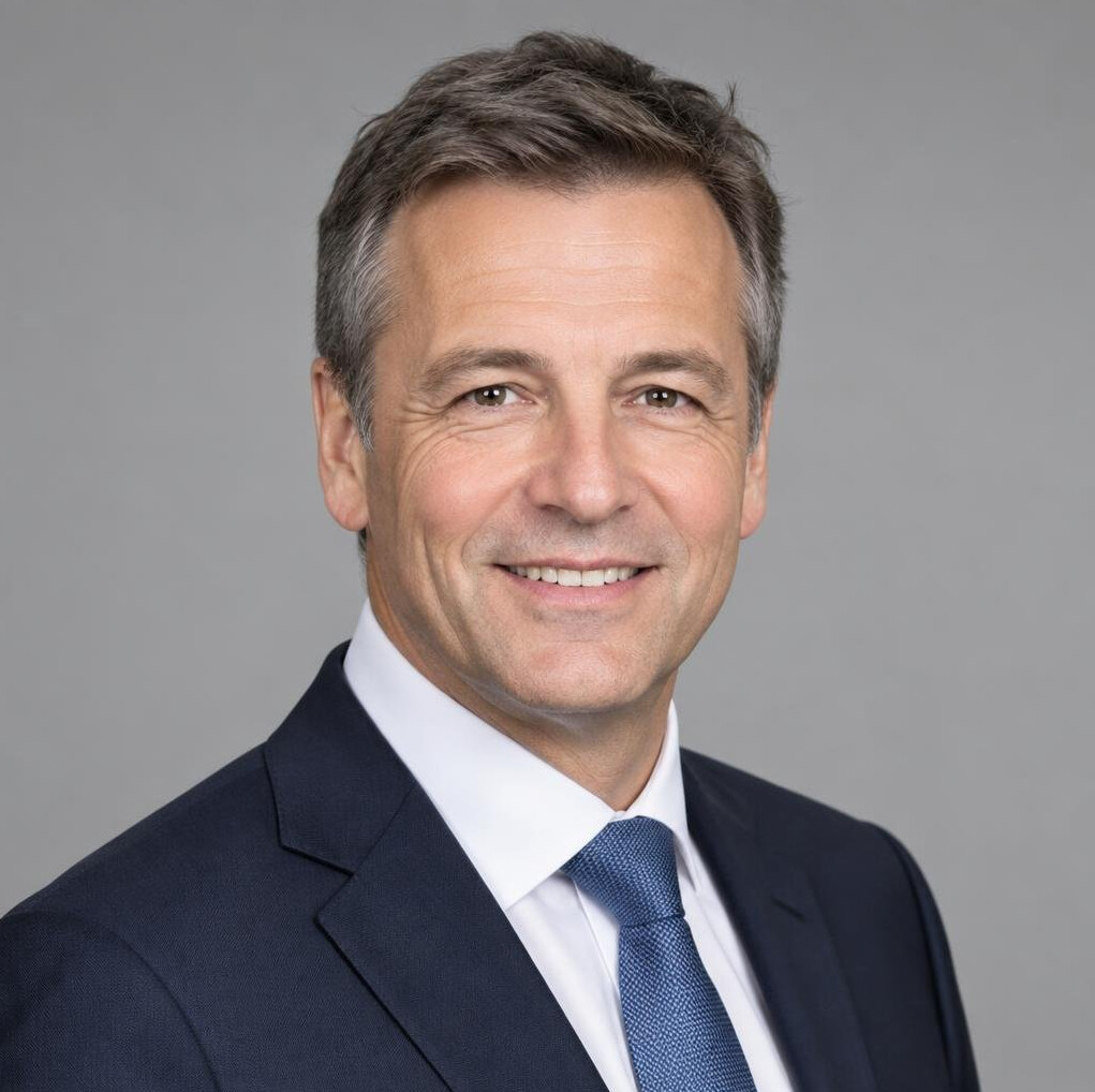 Studio portrait of a man in his 50s in business attire