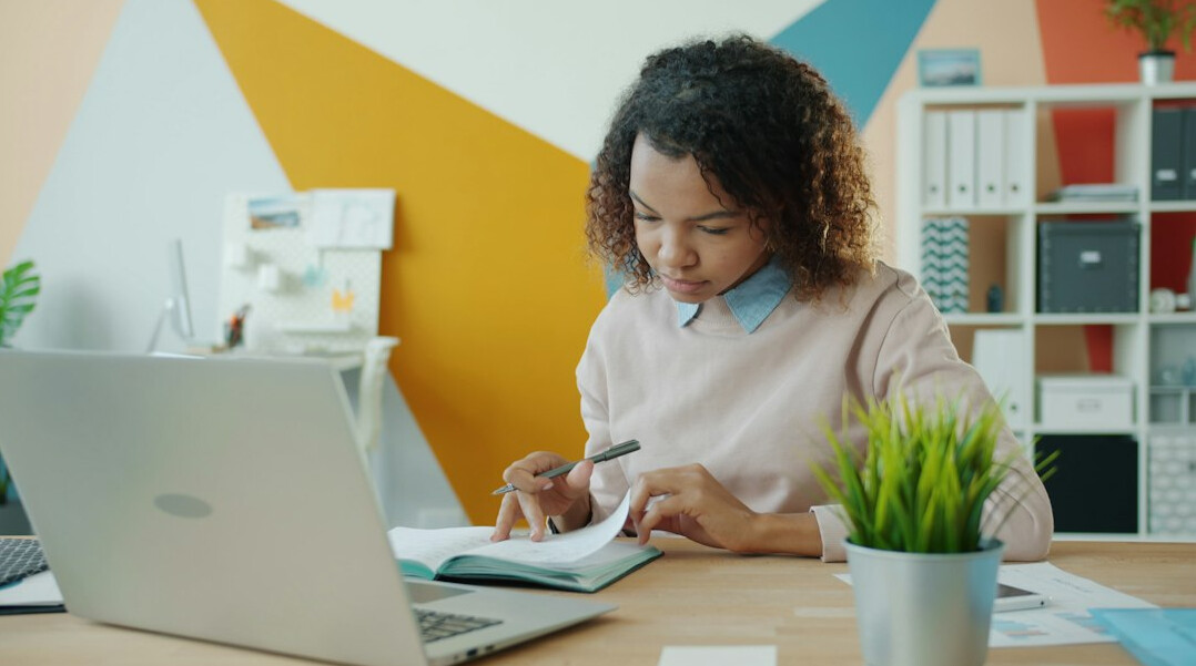 professional woman studying at desk