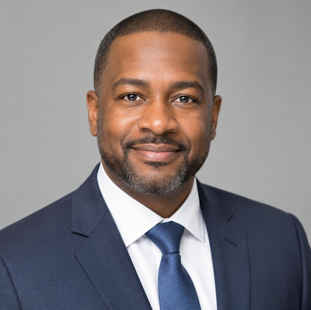 Studio portrait of a man in his 40s in business attire